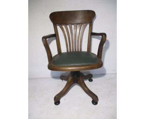 A W.B Limited oak swivel office chair (one foot missing)