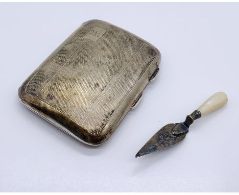 A hallmarked silver cigarette case along with a miniature silver trowel with mother of pearl handle