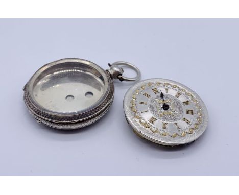 A hallmarked silver fob watch with chased silver dial- A/F