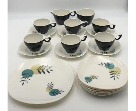 A quantity of Melaware, includes six cups with saucers plus side plates and one larger plate .