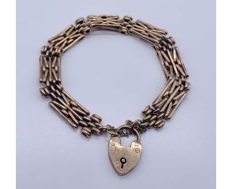 A 9ct gold gate bracelet with padlock, weight 15.9g