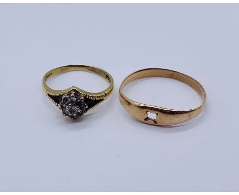 An 18ct gold diamond cluster ring- 1 stone missing (weight 2.6g) along with a tested 14ct gold ring- no stone (weight 2.5g)