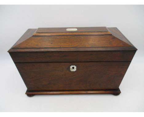 A 19th century Rosewood tea caddy with twin canister interior  
