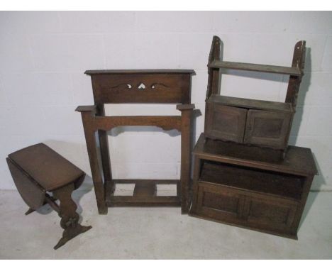 An assortment of oak furniture including a hall stand, a hanging shelf, cabinet etc 