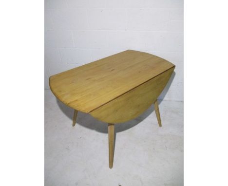 An Ercol "Blonde" dropleaf dining table