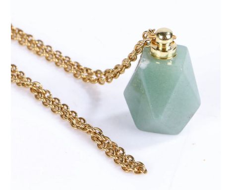 Jade pendant on a yellow metal chain&nbsp;