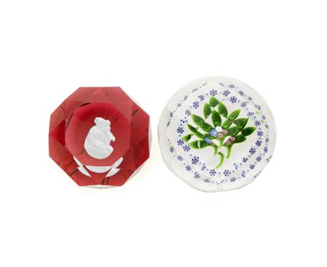 A Baccarat faceted 'Madonna and Child' sulphide paperweight and a St. Louis flat bouquet weight, circa 1850The first containi