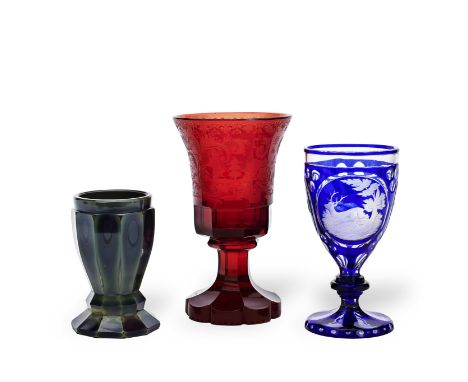 Three Bohemian engraved goblets and a Lithyalin beaker, 19th centuryComprising a pair of goblets overlaid in translucent blue