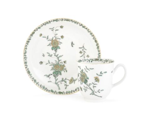A Worcester coffee cup and saucer, circa 1770Of plain form with a grooved loop handle, decorated in the workshop of James Gil