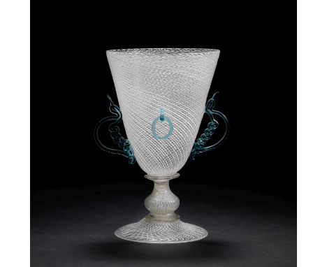 A fine Venetian or façon de Venise winged latticinio 'ring' goblet, 19th centuryIn vetro a reticello, decorated with fine spi