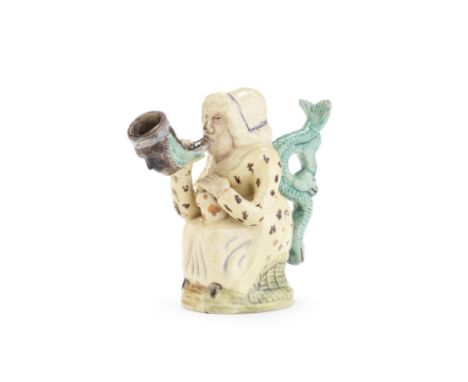 A creamware 'Martha Gunn' Toby Jug, circa 1800Of attractive small size, modelled as a seated woman wearing a pale yellow spot
