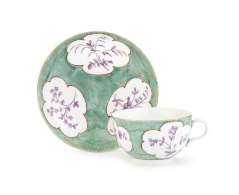 A Worcester teacup and saucer, circa 1765-70Decorated in the workshop of James Giles, painted in purple monochrome with three