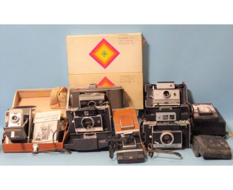 Polaroid land cameras: "Highlander", J66, 195, 180, 350, (cased), three others, two boxed accessory kits and other items. 