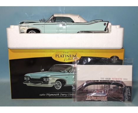 Sun Star, Platinum Collection, a 1960 Plymouth Fury Closed Convertible, mint, with all original wrapping, leaflet and metal t