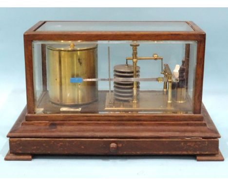 An oak-cased barograph by Chave &amp; Jackson Ltd, Hereford, with apron chart drawer, 37cm wide, 21.5cm high. 