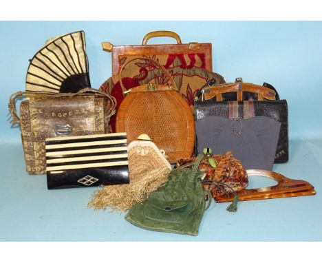 A lizard skin handbag, a vintage black and cream plastic evening purse and other handbags, (11). 