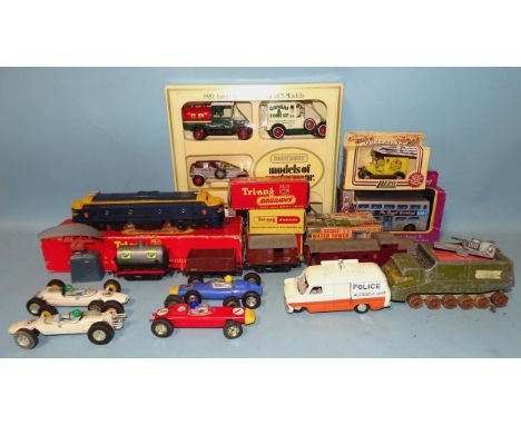 Four Triang Scalextric slot cars, unboxed, Matchbox Royal Wedding 1981 bus, boxed and other diecasts and Triang OO gauge roll