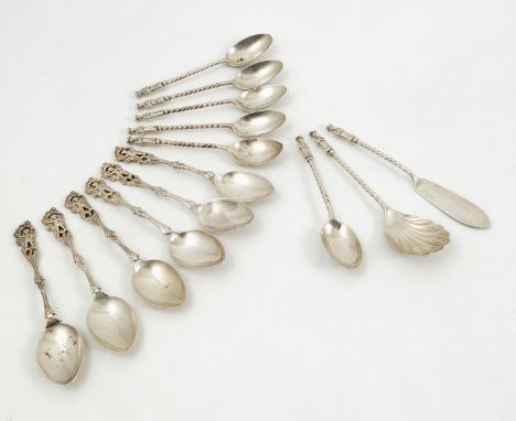 A set of six silver teaspoons, together with matching jam spoon and butter knife, all with apostle finial and twisted stem, L