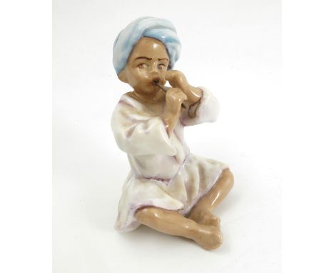 A Royal Worcester figure, India, modelled by F G Doughty, model number 3071, dated 1957