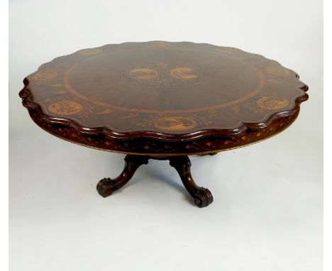 A 19th century Killarney yew wood table top, with a central circular panel with a harp and flowers with similar decoration to