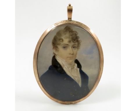 A 19th century portrait miniature, painted on ivory of a man wearing a white cravat and navy coat, the gold coloured case eng