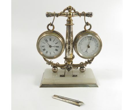 A 19th century silver plate cased desk top weather station, formed as an anchor with thermometer to the centre, flanked by a 