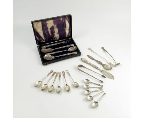 A cased set of four afternoon tea condiment cutlery, comprising two sifting spoons, spoon and a fork, with continental marks,