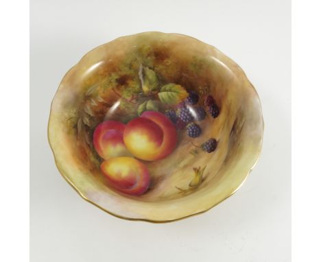 A Royal Worcester bowl, the interior painted with fruit to a mossy background by Price with shaped edge, circular foot, diame