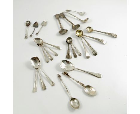 A collection of hallmarked silver condiment spoons, to include a set of four Georgian salt spoons, engraved with a crest, a s