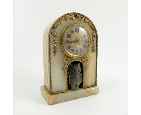 A 19th century marble mantel clock, the dial with silvered chapter ring and gold coloured numbers, the domed case with silver