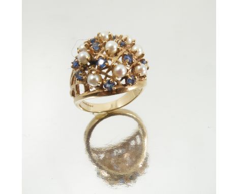 A sapphire and cultured pearl bombe ring, stamped '14k', finger size L1/2, 6.5g gross