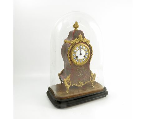 A Howell & Co Paris boulle mantel clock, with striking movement, the gilt metal dial with enamelled Roman numerals and centre