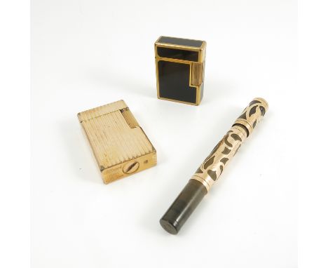 A Waterman's fountain pen, with 14kt gold filigree overlay decoration, boxed, together with two Dupont lighters, one in ribbe