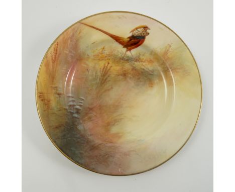 A Royal Worcester side plate, decorated with an Asiatic pheasant in landscape, dated 1924, diameter 6ins Condition report: A 