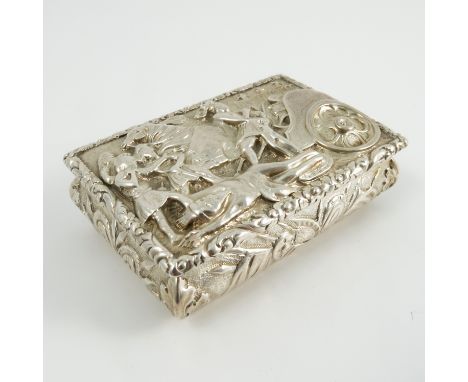 A Georgian silver table snuff box, the cover heavily embossed with a Classical scene with a horse pulling a chariot, warriors