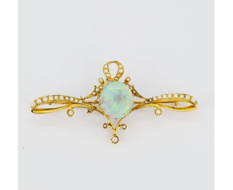 A yellow metal (tested high carat gold) brooch set with a cabochon cut opal and seed pearls, approx. 6.3ct opal L. 7cm.