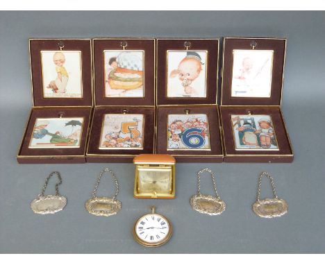 Eight framed and boxed Lucie Attwell prints together with an eight day brass cased Goliath type travel watch/clock, a further