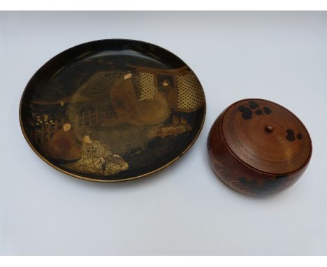 A Japanese lacquer plate decorated with figures, 26cm, and an elm lidded tea caddy