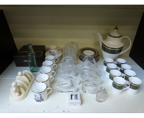 A quantity of Royal Worcester coffee cans and saucers, Royal Doulton 'Vanborough' coffee set, Wedgwood glass paperweights etc
