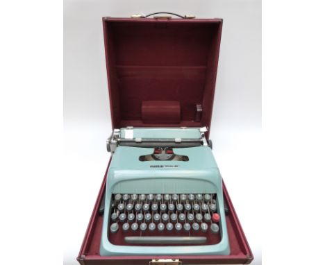Olivetti Studio 44 typewriter in original case