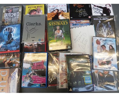 A collection of signed DVDs to include Blues Brothers signed by Carrie Fisher, Gladiator, Nightmare Before Christmas, Top Gun