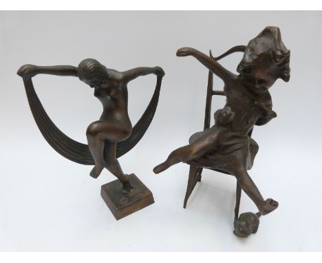 Two bronzed figures, one an Art Deco style nude lady dancing, 24cm tall, the other a young girl on a chair playing with two c