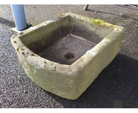 A small D end natural stone trough, W46 x D53 x H20cm