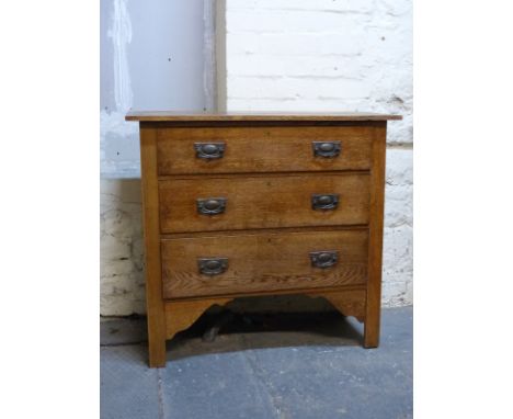 An oak chest of three drawers with Art Nouveau style handles, W92 x D43 x H86cm