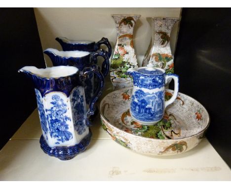 A pair of Art Deco Phoenix ware vases and shallow bowl together with a George Jones Abbey pattern coffee pot and three flow b