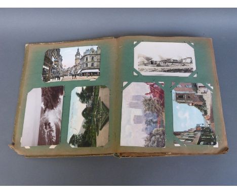 An Edwardian postcard album with virtually all cards addressed to Mrs Adams, Gloucester c1906, approximately 280 cards. Views