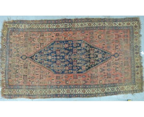 A 19thC/20thC Persian carpet with central blue gul, 215 x 118cm 