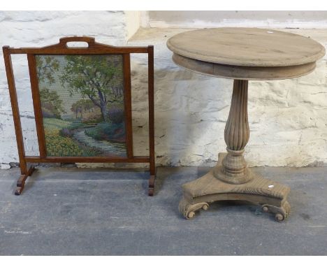 A pine occasional table, diameter 61 x H74cm and a fire screen