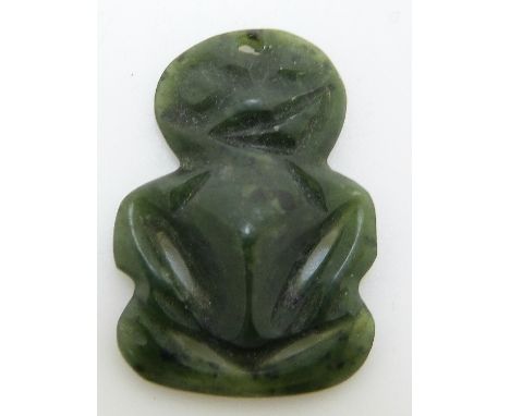 A nephrite jade Maori tiki, approximately 3.2 x 2.1cm