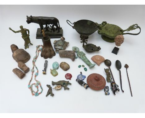 A quantity of Ancient Roman style items including lamp, spoons, wolf statue etc
